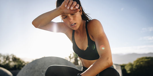woman sweating after HIIT yoga session