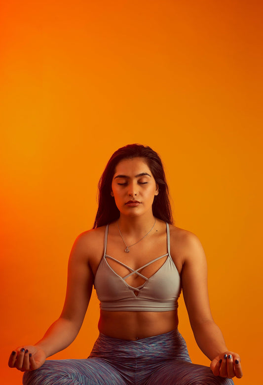 woman-siting-during-meditation-flow-pose