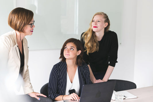 three-business-women-choosing-right-product