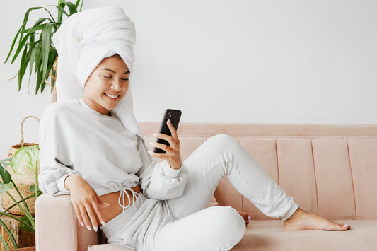 woman-wearing-sweats-on-mobile-phone