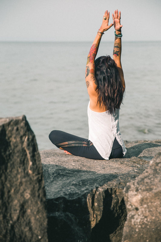 yoga-posing-tattooed-woman