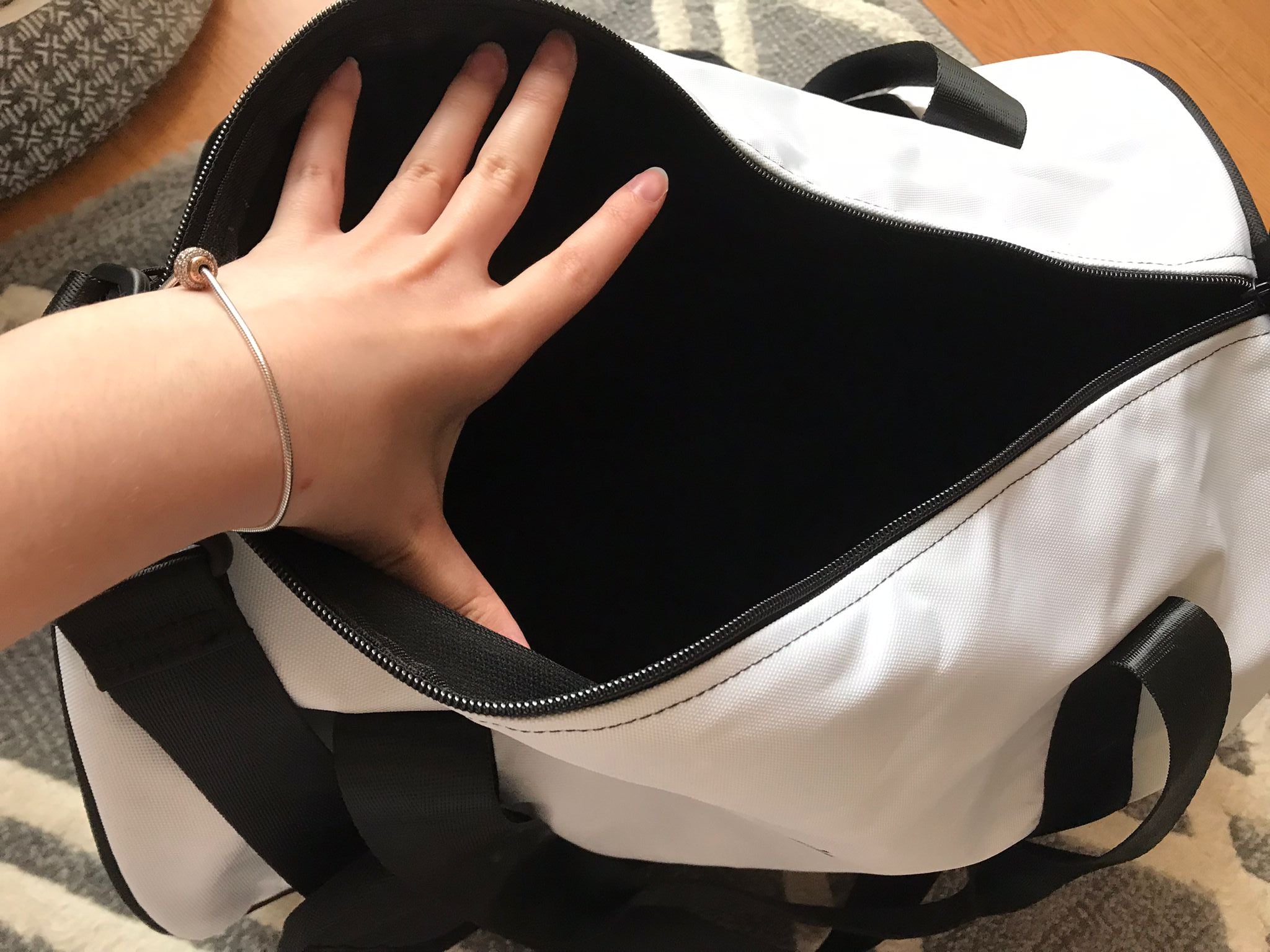 review picture of stylish black and white duffel bag from Jain Yoga brand